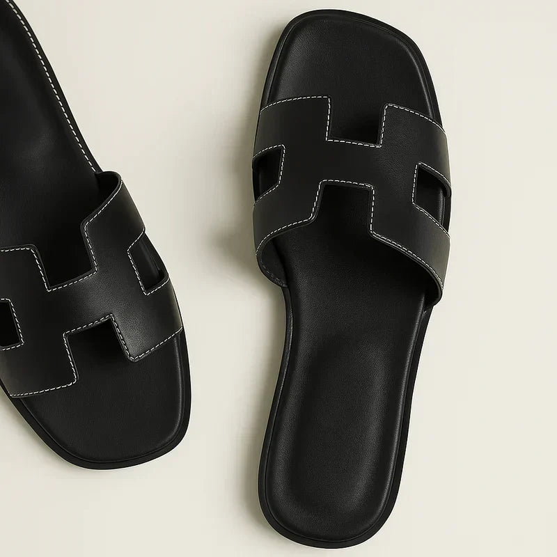 Ivyris | Elegante flade sandaler med udskåret design
