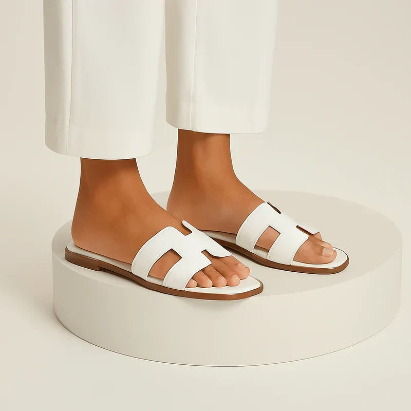 Ivyris | Elegante flade sandaler med udskåret design
