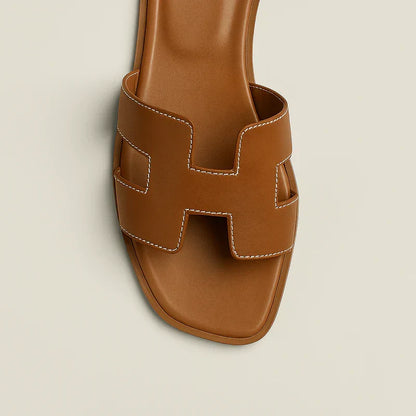 Ivyris | Elegante flade sandaler med udskåret design