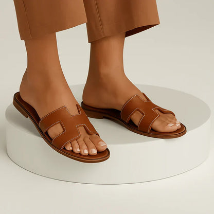Ivyris | Elegante flade sandaler med udskåret design