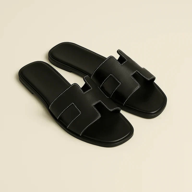 Ivyris | Elegante flade sandaler med udskåret design
