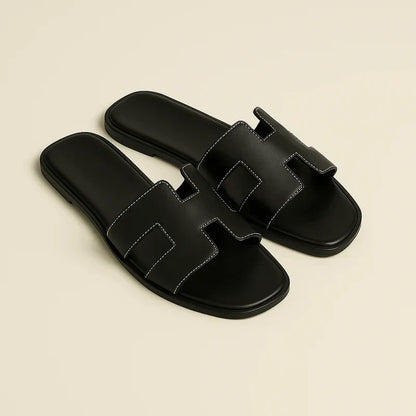 Ivyris | Elegante flade sandaler med udskåret design
