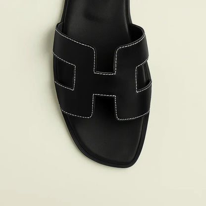 Ivyris | Elegante flade sandaler med udskåret design