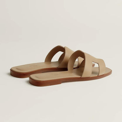 Ivyris | Elegante flade sandaler med udskåret design