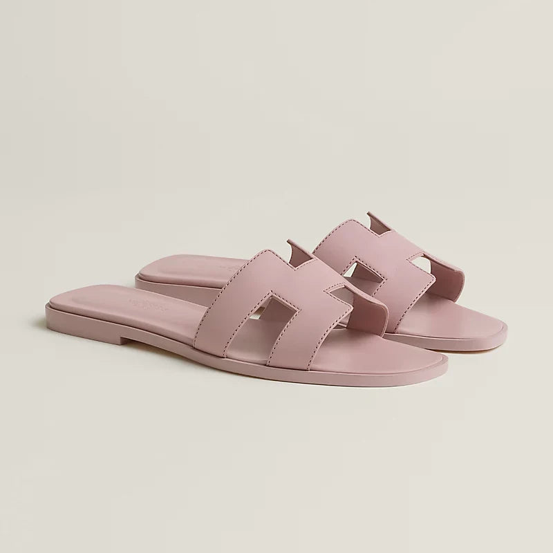 Ivyris | Elegante flade sandaler med udskåret design