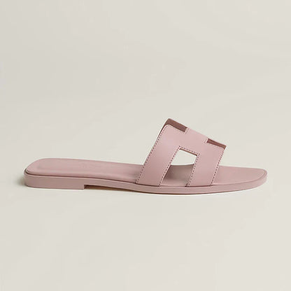 Ivyris | Elegante flade sandaler med udskåret design