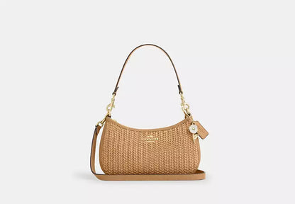 Coach Teri | Flettet skuldertaske med charm