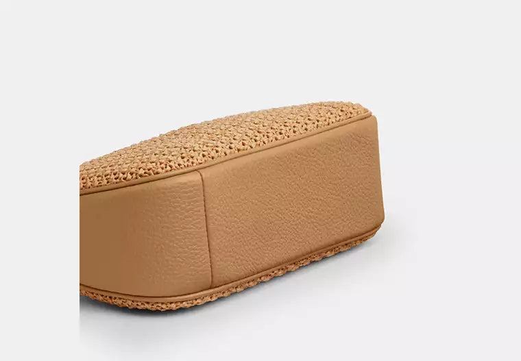 Coach Teri | Flettet skuldertaske med charm