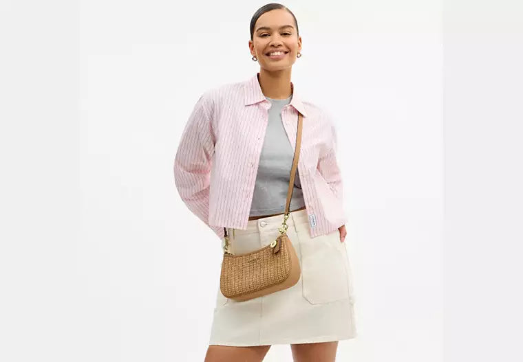 Coach Teri | Flettet skuldertaske med charm