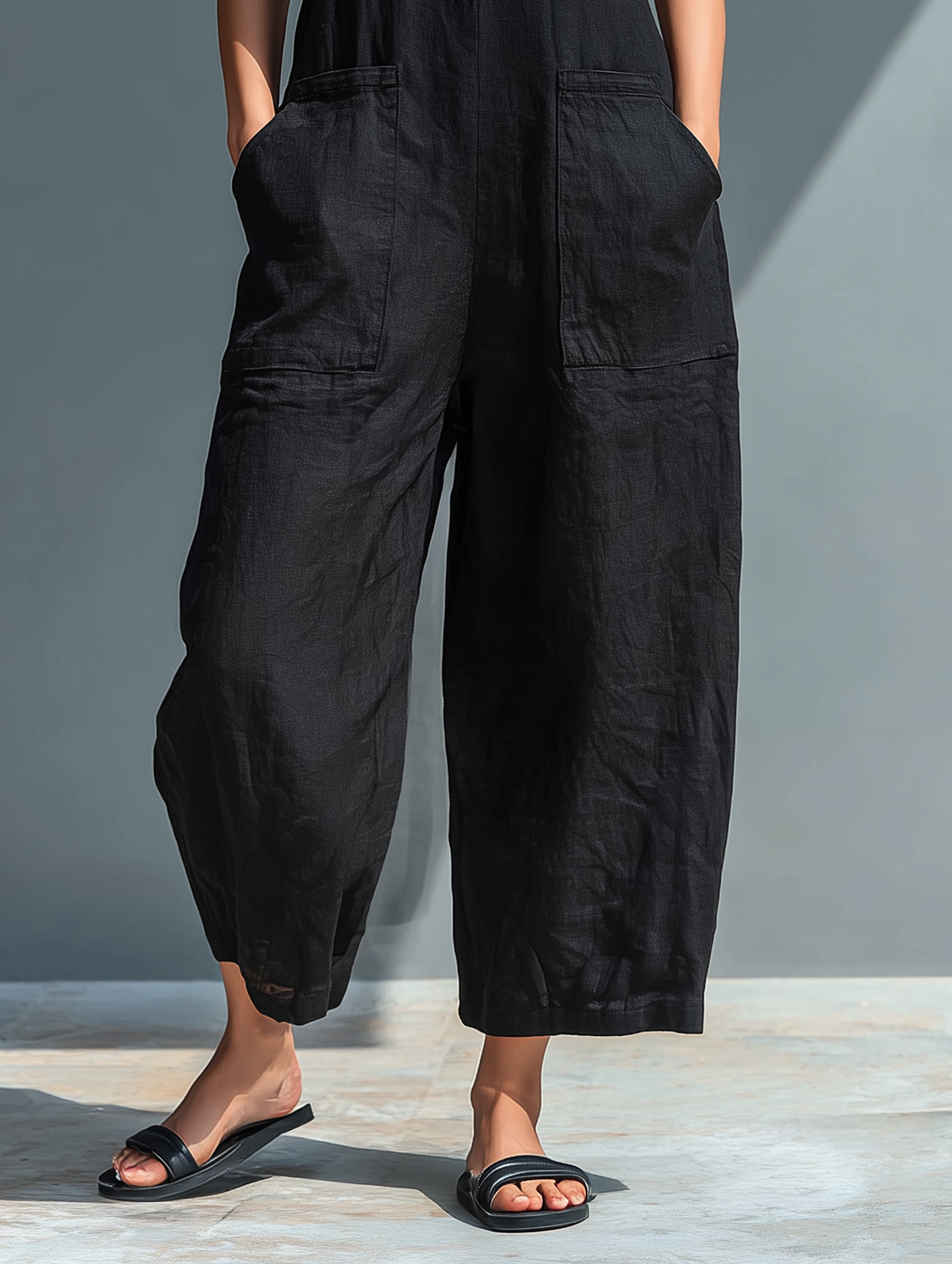 Juliette | Ærmeløs jumpsuit i hørblanding med knaplukning