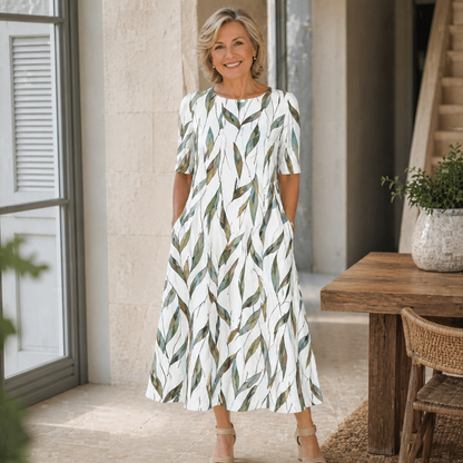 Sophie | Flatterende blomstret midikjole med lommer