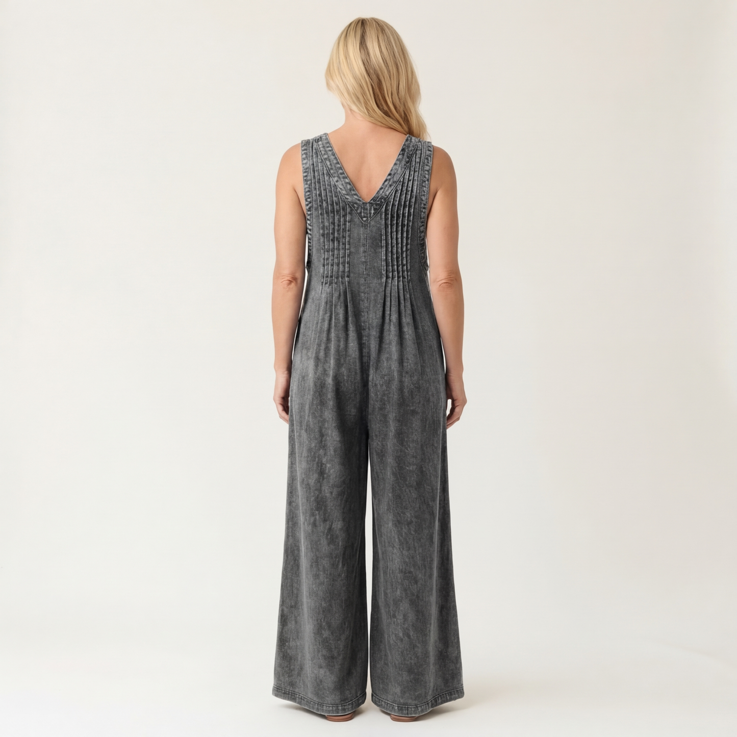 Griselda | Plisseret denimjumpsuit med vide ben