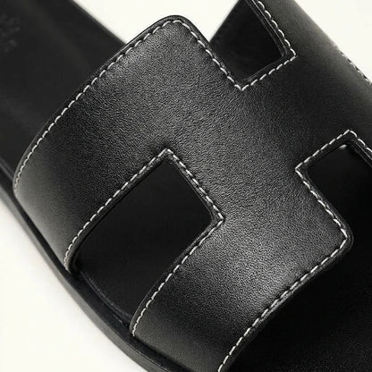 Ivyris | Elegante flade sandaler med udskåret design