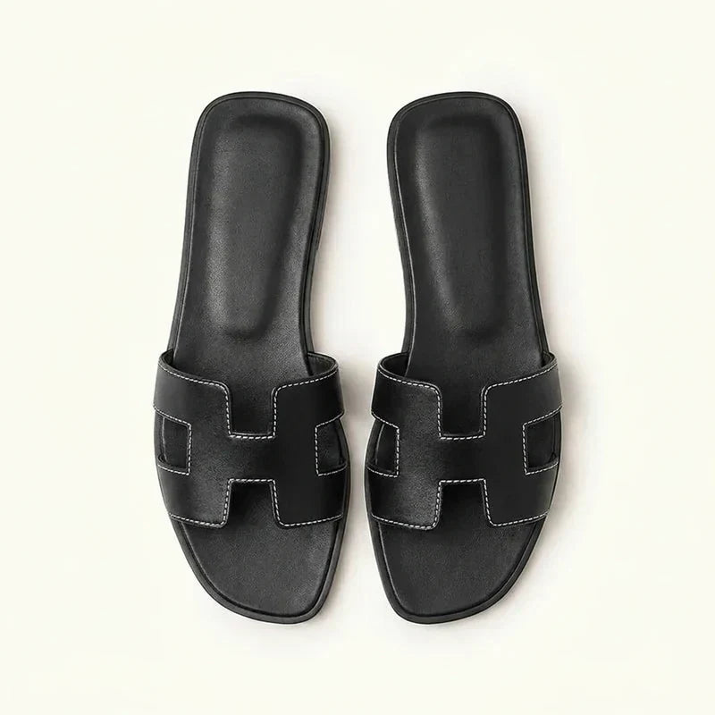 Ivyris | Elegante flade sandaler med udskåret design