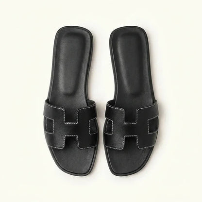 Ivyris | Elegante flade sandaler med udskåret design
