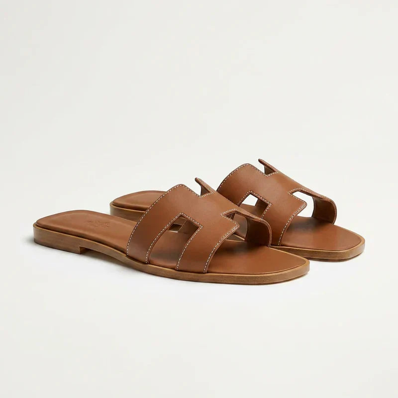 Ivyris | Elegante flade sandaler med udskåret design