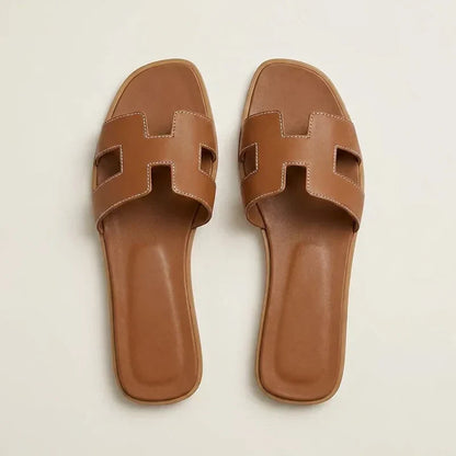 Ivyris | Elegante flade sandaler med udskåret design