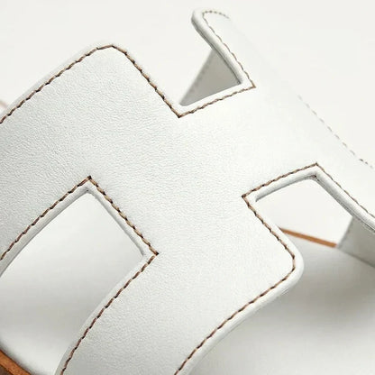 Ivyris | Elegante flade sandaler med udskåret design