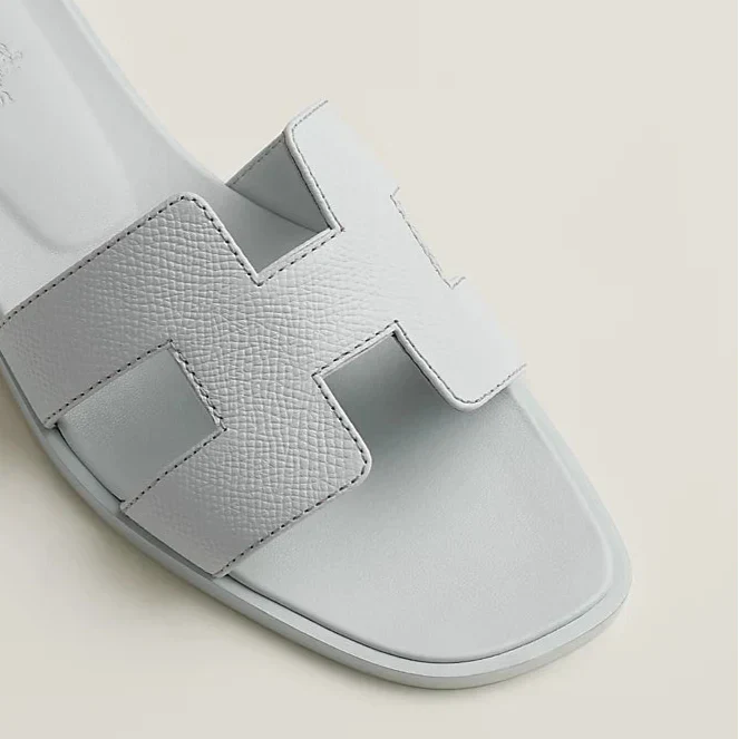 Ivyris | Elegante flade sandaler med udskåret design