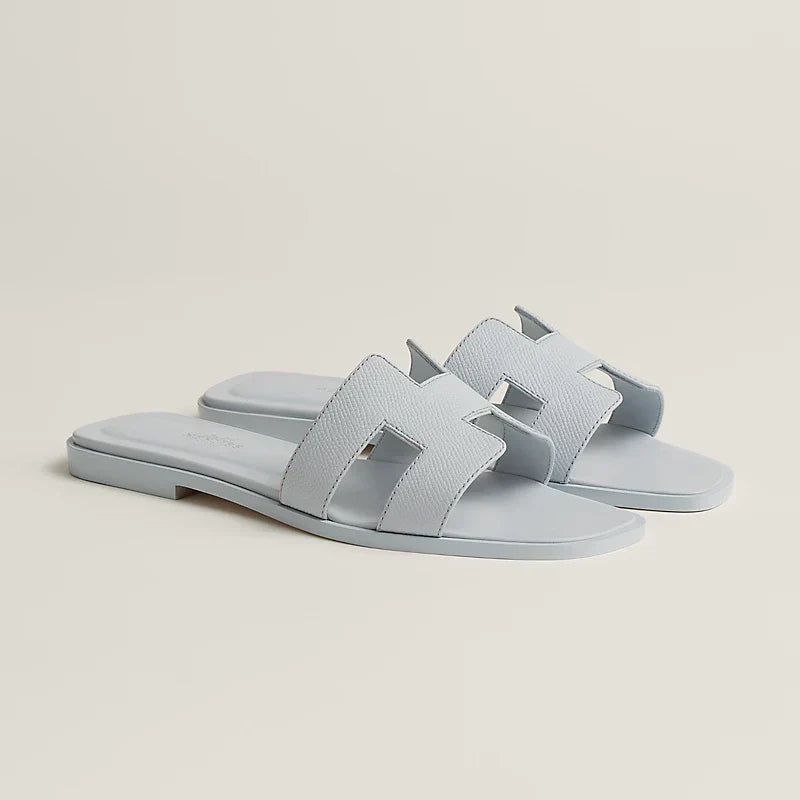 Ivyris | Elegante flade sandaler med udskåret design