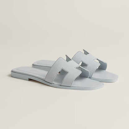 Ivyris | Elegante flade sandaler med udskåret design
