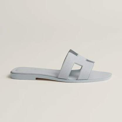 Ivyris | Elegante flade sandaler med udskåret design